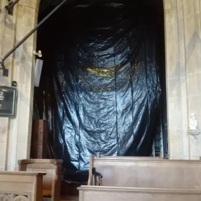 The organ is wrapped in plastic for protection